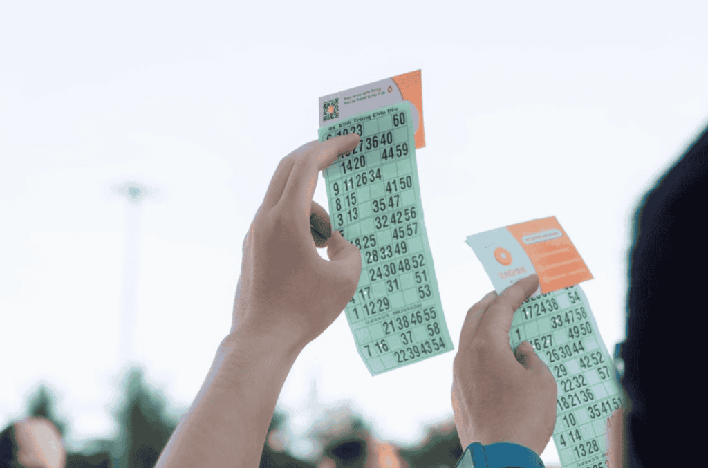 lottery tickets held up outdoors